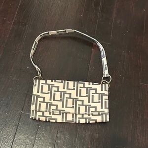 Elegant Cream and Black Geometric Shoulder Bag